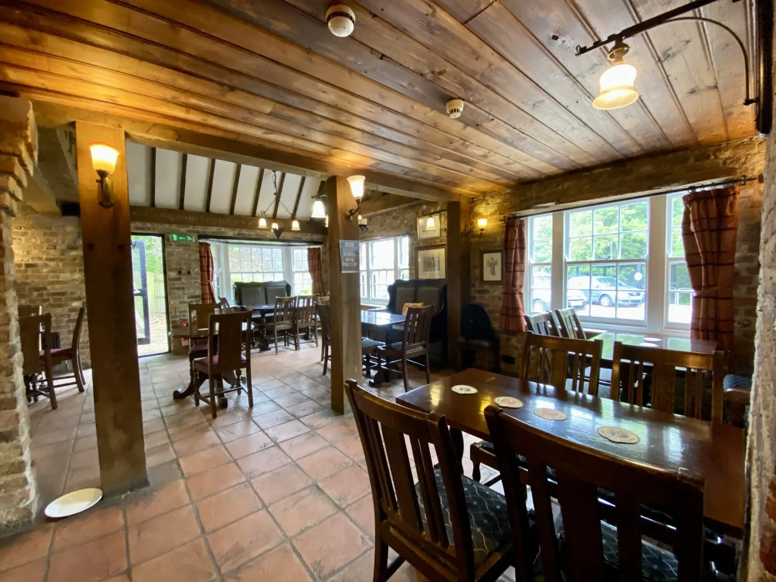 The snug at The Horns, with beams and low light